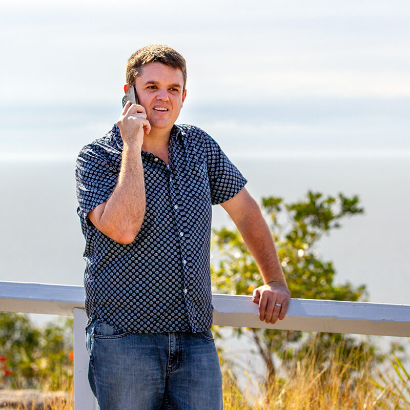 Queensland Property Podcast host on the phone